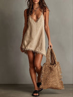 Women's V-neck slip mini dress with fringe trim, sleeveless streetwear style by FitiqueFit, perfect for casual summer looks.