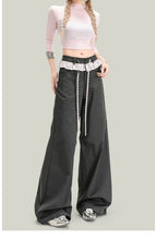 Women’s vintage lace panel casual pants from FitiqueFit, featuring a relaxed streetwear style with lace accents and comfortable fit.