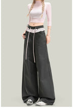 Women’s vintage lace panel casual streetwear pants by FitiqueFit, featuring lace accents and relaxed fit for everyday wear.