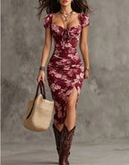 Women's vintage puff-sleeve high-waist split maxi dress by FitiqueFit, featuring a flowing silhouette and elegant design.