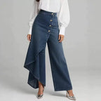 Women's washed denim skort with button closure, casualwear from Plush Fashion Hub, showing front view with pockets and frayed hem.