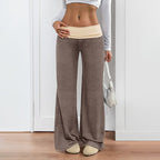 Women’s wide-leg patchwork casual pants by FitiqueFit, featuring a relaxed fit and colorful patchwork design.