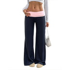 Women’s wide-leg patchwork casual pants by FitiqueFit, featuring a relaxed fit and colorful patchwork design.