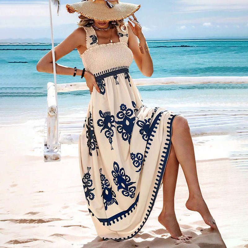 Women’s wide-strap printed maxi dress by FitiqueFit, casualwear with floral pattern and flowing fabric, perfect for summer days.