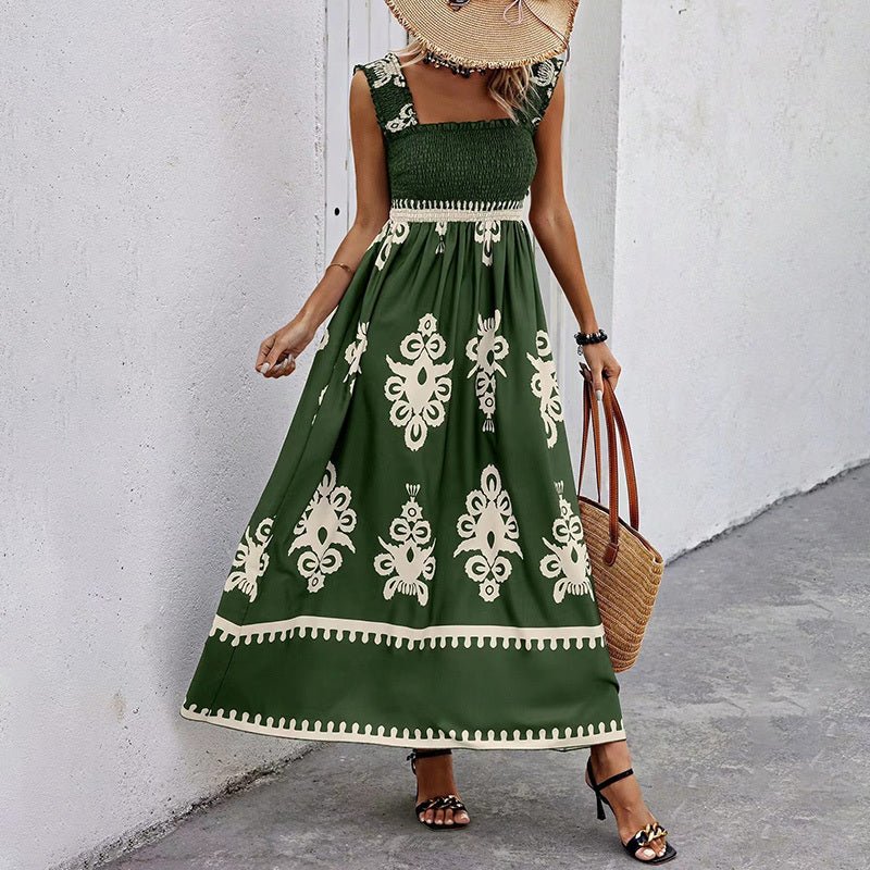 Women’s wide-strap printed maxi dress by FitiqueFit, casualwear with colorful floral pattern and flowing fabric.