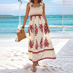 Women’s wide-strap printed maxi dress by FitiqueFit, casualwear with vibrant floral pattern and flowing silhouette.