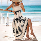 Women’s wide-strap printed maxi dress by FitiqueFit, casualwear with a flowing silhouette and vibrant floral pattern.