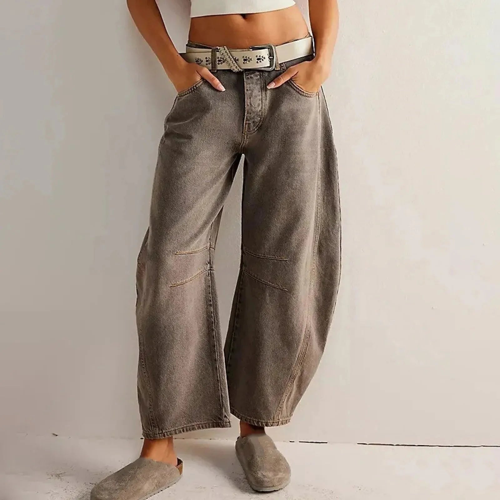 Women's Y2K baggy mid-waist wide-leg jeans by FitiqueFit, showcasing relaxed fit, high waist, and 90s streetwear style.