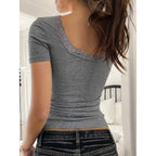 Women’s Y2K lace trim slim fit tee by FitiqueFit, casual U-neck short sleeve top with delicate lace details.