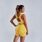 Women's FitiqueFit activewear yoga set with a vest and shorts, perfect for exercise and casual wear.