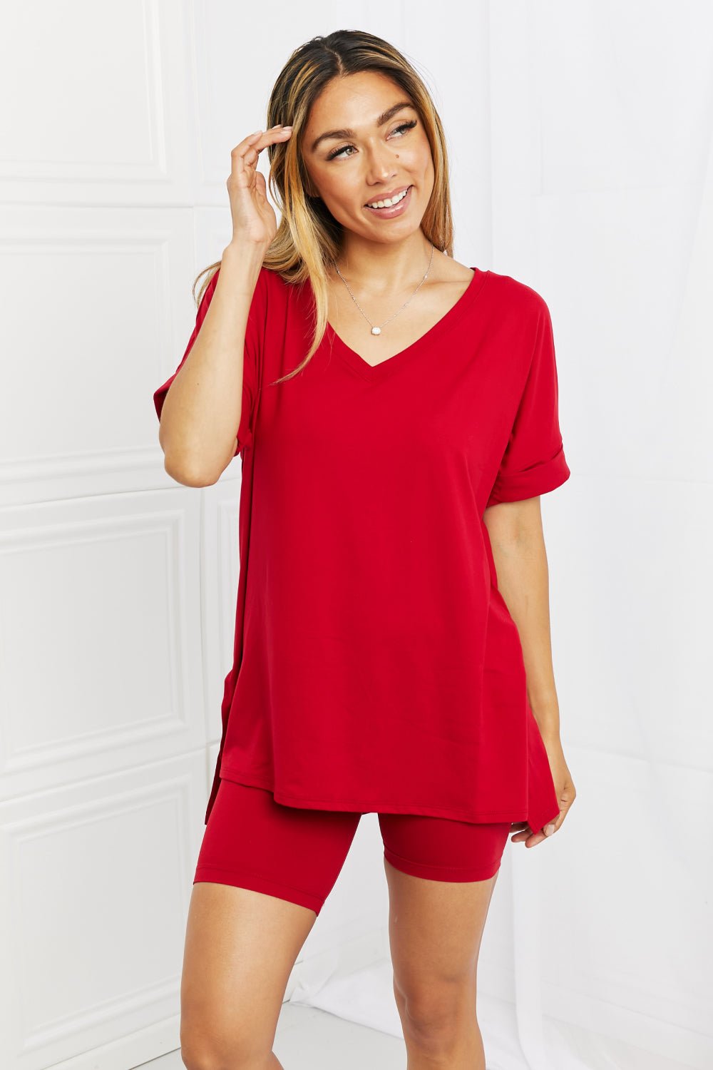 Burgundy women's brushed V-neck lounge top and biker shorts set by Plush Fashion Hub, comfortable and casual women’s apparel.